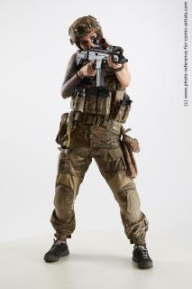 Mrs.Physiotherapist Aiming Rifle Pose
